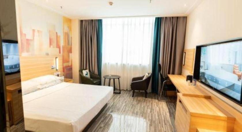 TV a/nebo společenská místnost v ubytování City Comfort Inn Yingcheng Railway Station Shanghe Square