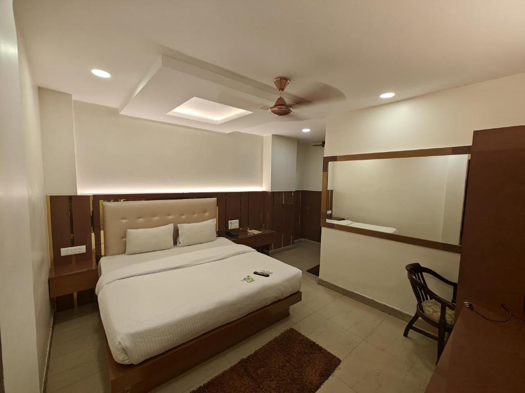 Postel nebo postele na pokoji v ubytování Hotel Apple Villa - New Delhi