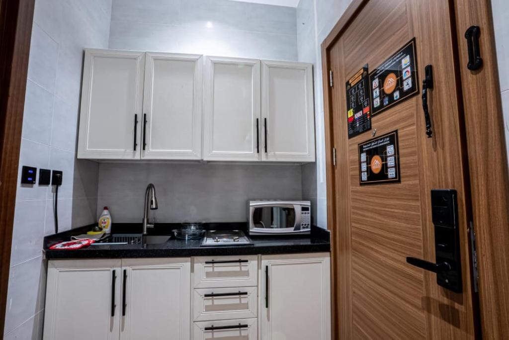 Cucina o angolo cottura di نوران استار للشقق المخدومة