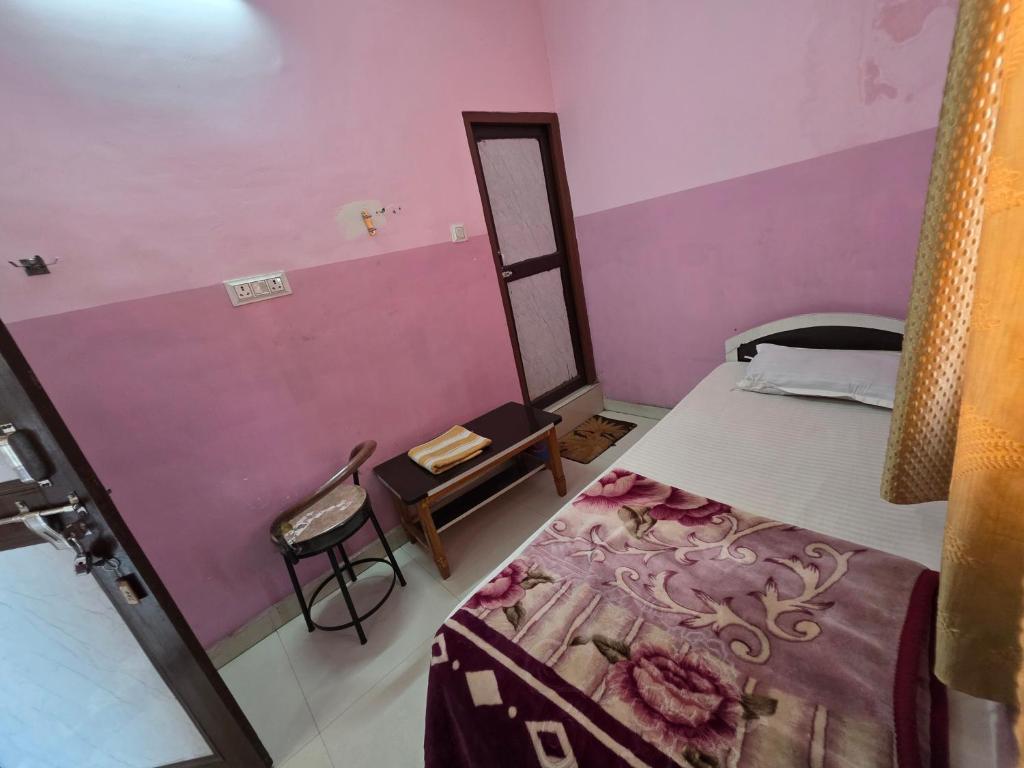 Postel nebo postele na pokoji v ubytování Hotel Welcome Nepal