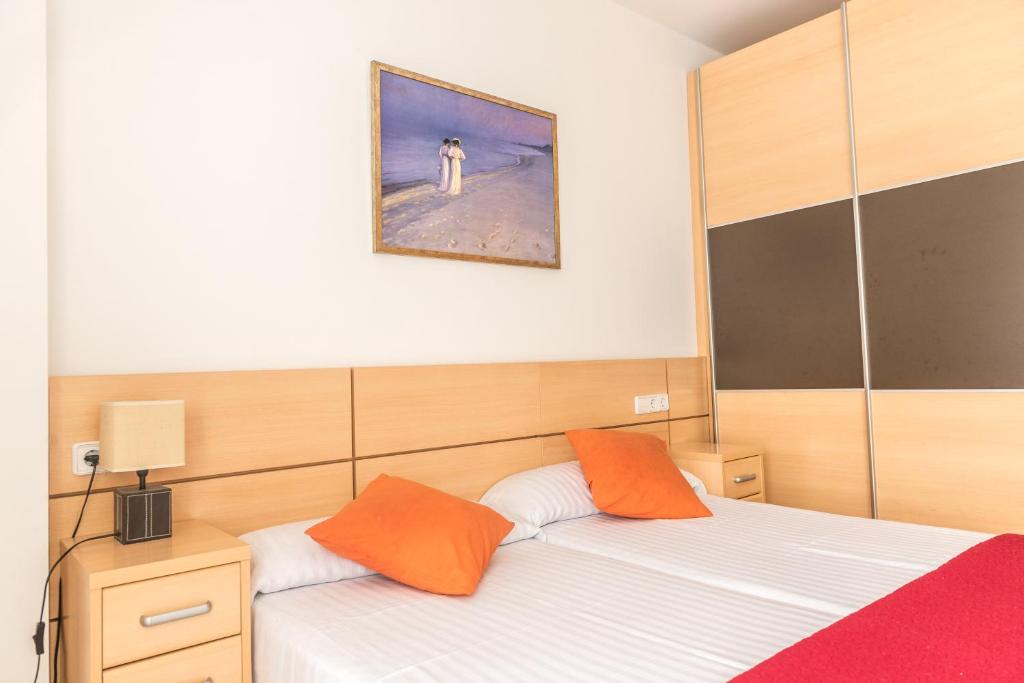 Postel nebo postele na pokoji v ubytování Apartamentos Navas 2