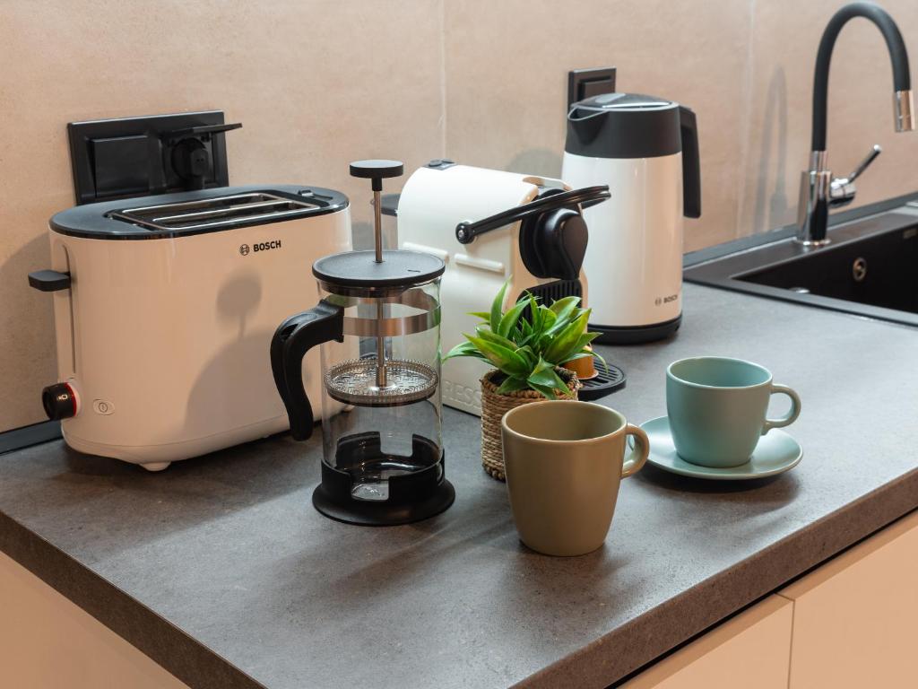 Kuchyň nebo kuchyňský kout v ubytování Canva Living