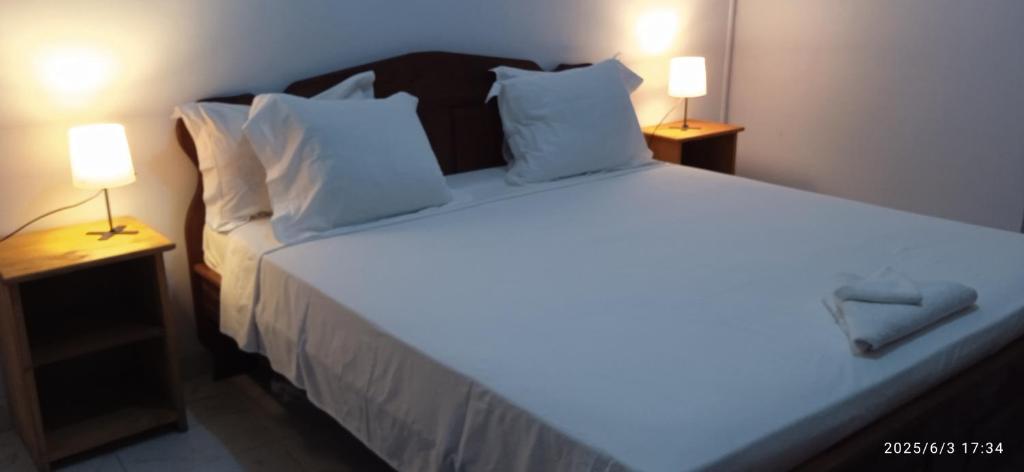 Postel nebo postele na pokoji v ubytování AUBERGE de L'HIPPOCAMPE