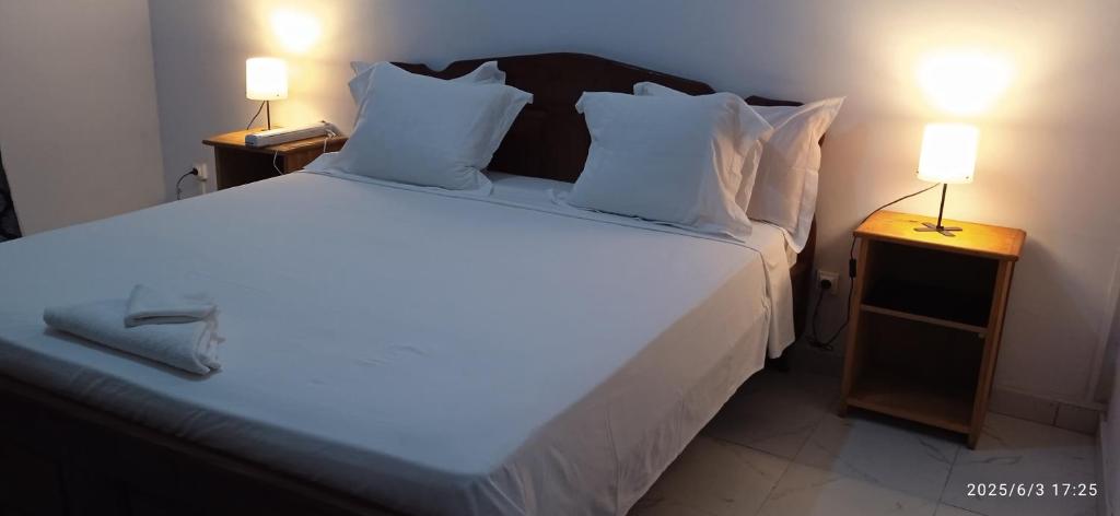 Postel nebo postele na pokoji v ubytování AUBERGE de L'HIPPOCAMPE