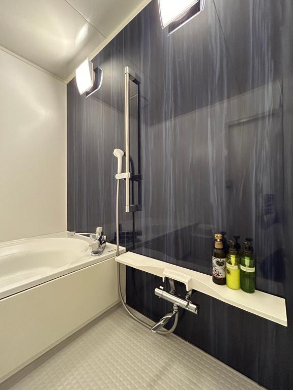 Koupelna v ubytování Hotel Takao Asile