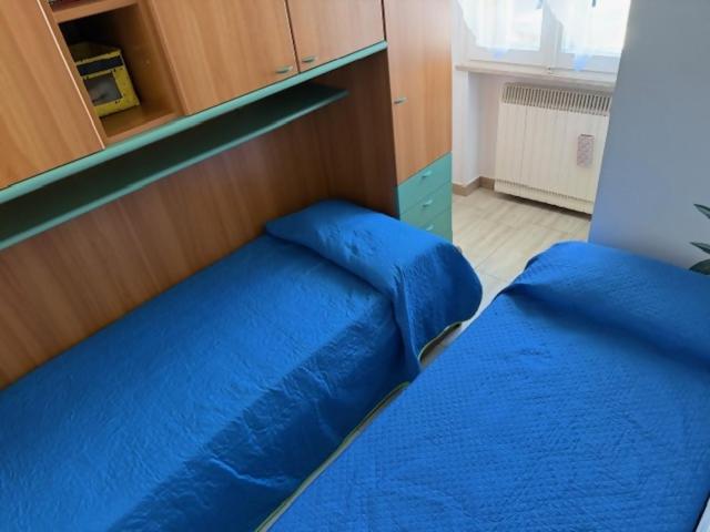 Postel nebo postele na pokoji v ubytování Viola lido adriano