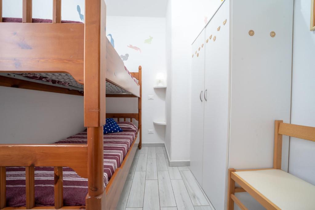 Postel nebo postele na pokoji v ubytování Rosa lido adriano centro citta