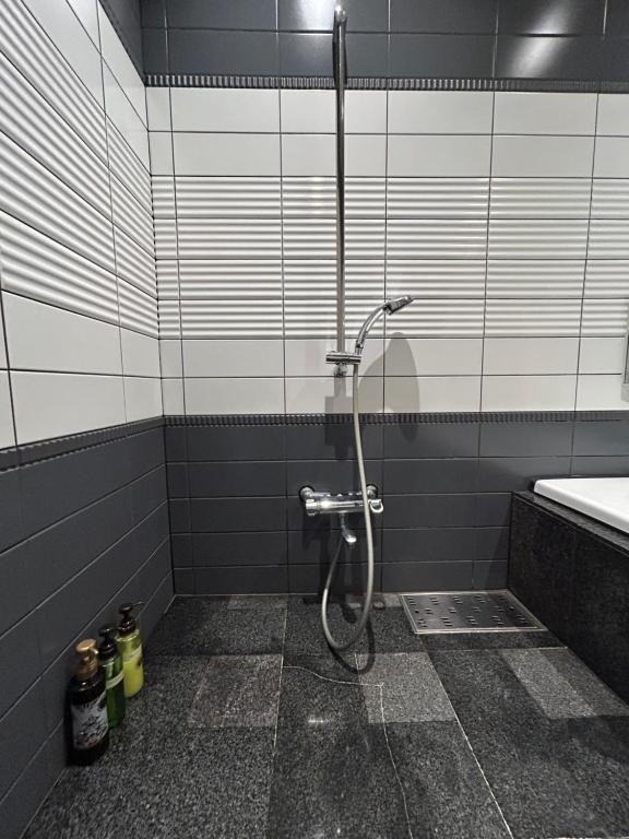 Koupelna v ubytování Hotel Takao Asile