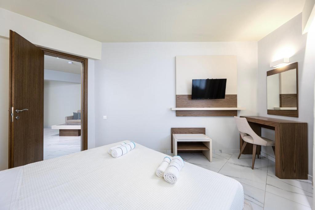 Postel nebo postele na pokoji v ubytování Harmony Rethymno Beach