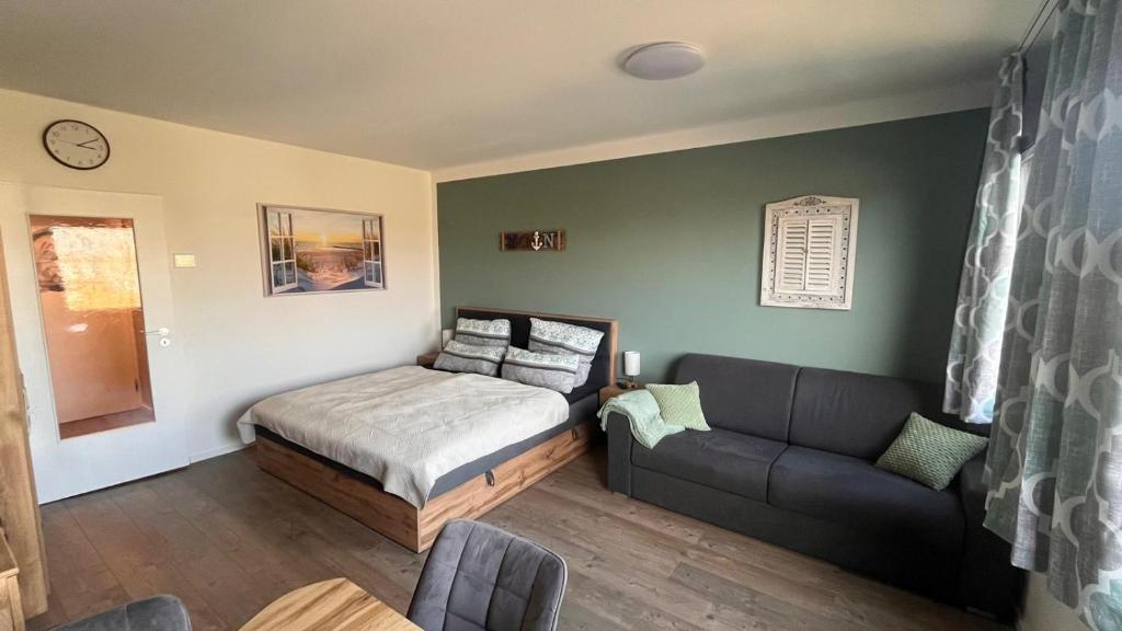 En eller flere senge i et værelse på Kleine Seemöwe