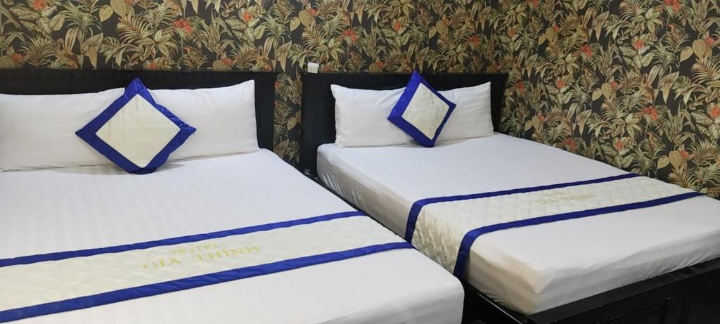 Ένα ή περισσότερα κρεβάτια σε δωμάτιο στο Hotel giathinh