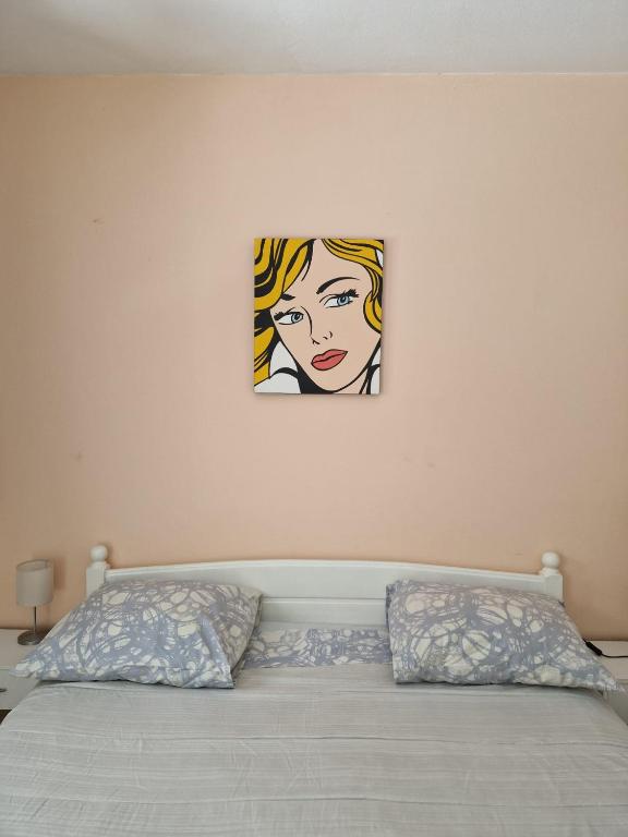 Postel nebo postele na pokoji v ubytování Apartments Adriatic
