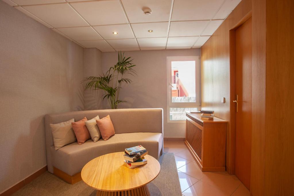 Posezení v ubytování Hostal Residencia Sutimar