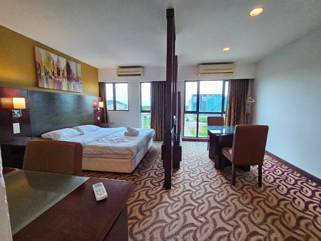 Postel nebo postele na pokoji v ubytování Kota Kinabalu City Ensuite at SCSP Ming Garden