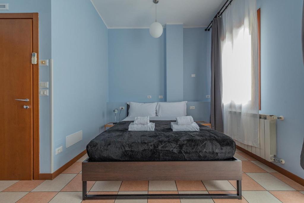 Postel nebo postele na pokoji v ubytování Marconi Lodge