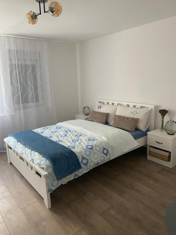 Postel nebo postele na pokoji v ubytování Kućerak kraj Dunava