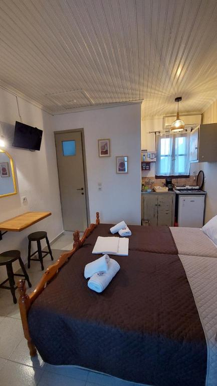 Postel nebo postele na pokoji v ubytování SunRiseStudiosPapanero