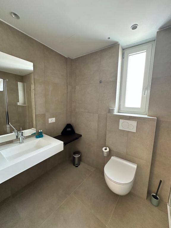 Kúpeľňa v ubytovaní Petit Hotel