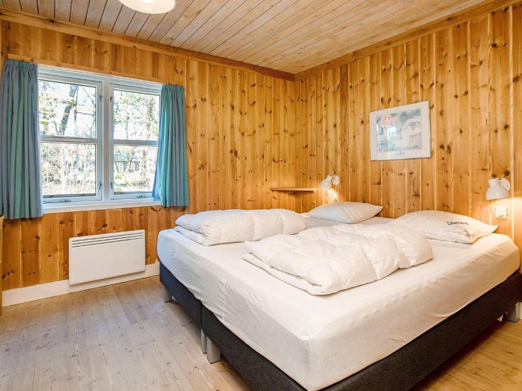 Postel nebo postele na pokoji v ubytování Marielyst Holiday Center