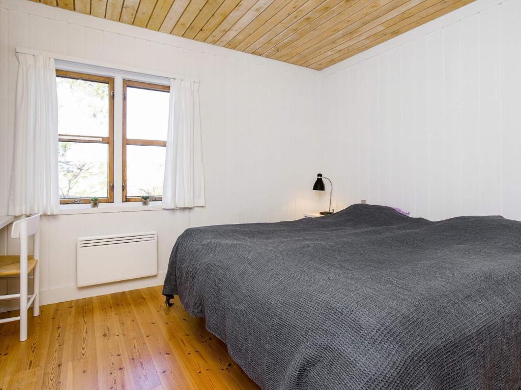 Postel nebo postele na pokoji v ubytování Marielyst Holiday Center