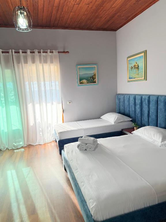 Postel nebo postele na pokoji v ubytování Hotel Bojko