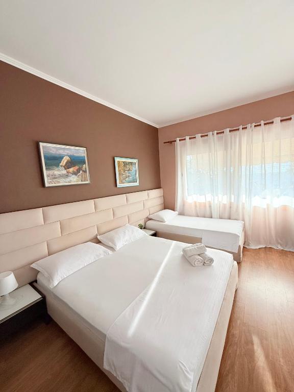 Postel nebo postele na pokoji v ubytování Hotel Bojko
