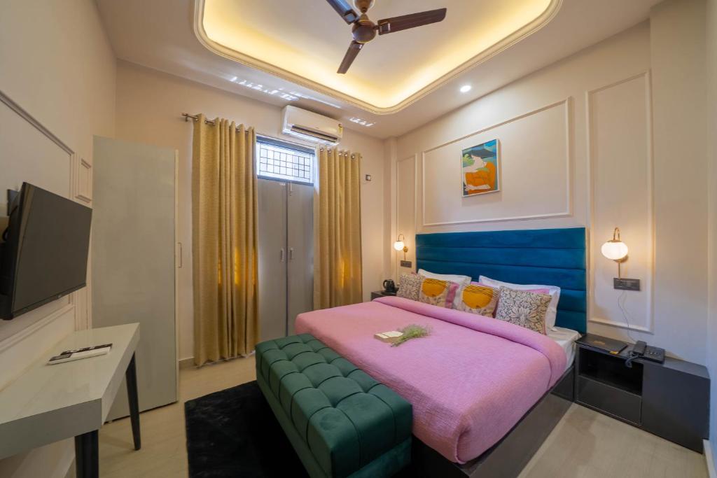 Postel nebo postele na pokoji v ubytování Perfectstayz Aalaya suites