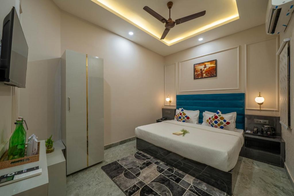 Postel nebo postele na pokoji v ubytování Perfectstayz Aalaya suites