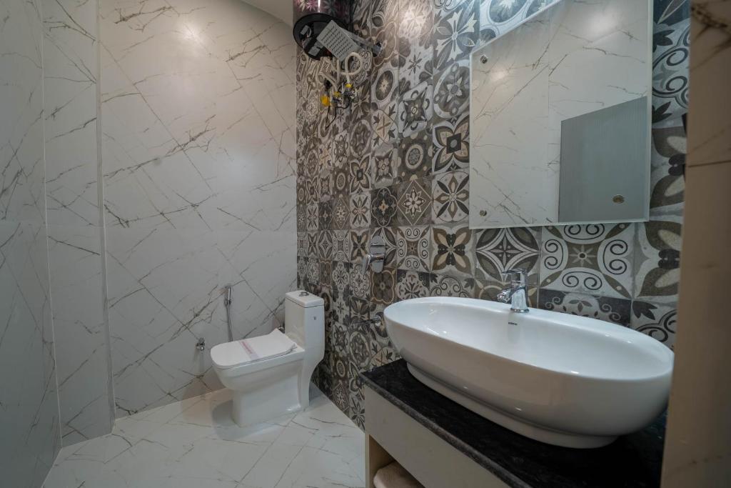 Koupelna v ubytování Perfectstayz Aalaya suites