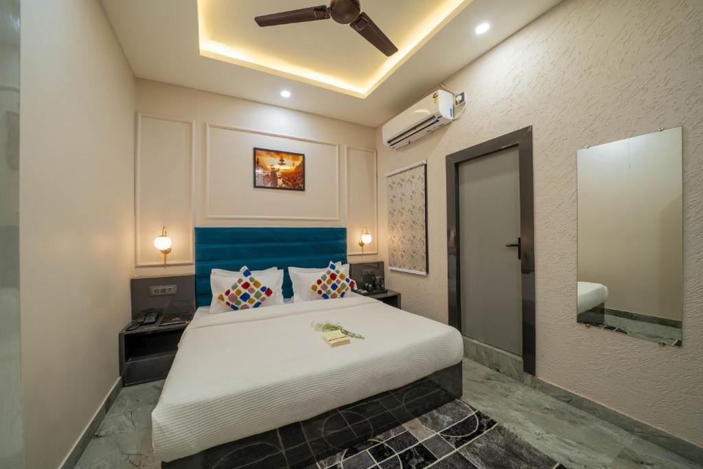 Postel nebo postele na pokoji v ubytování Perfectstayz Aalaya suites