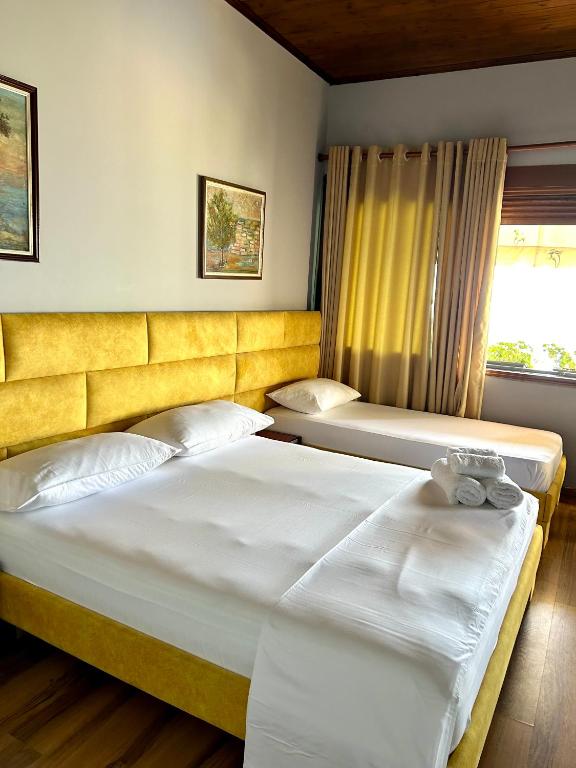 Postel nebo postele na pokoji v ubytování Hotel Bojko