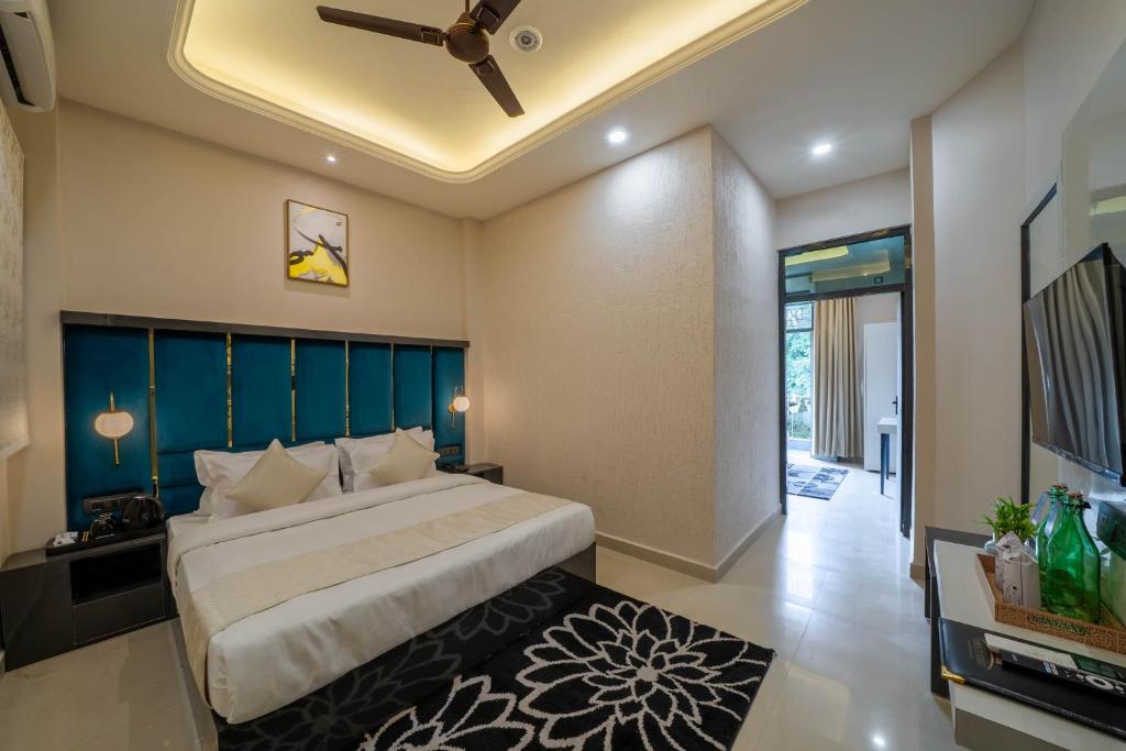 Postel nebo postele na pokoji v ubytování Perfectstayz Aalaya suites