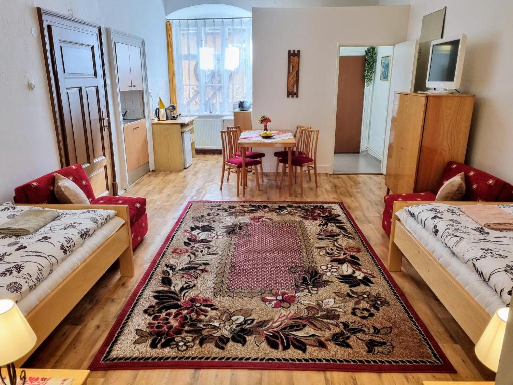 Posteľ alebo postele v izbe v ubytovaní Apartment in a historical house in the center of Levoča
