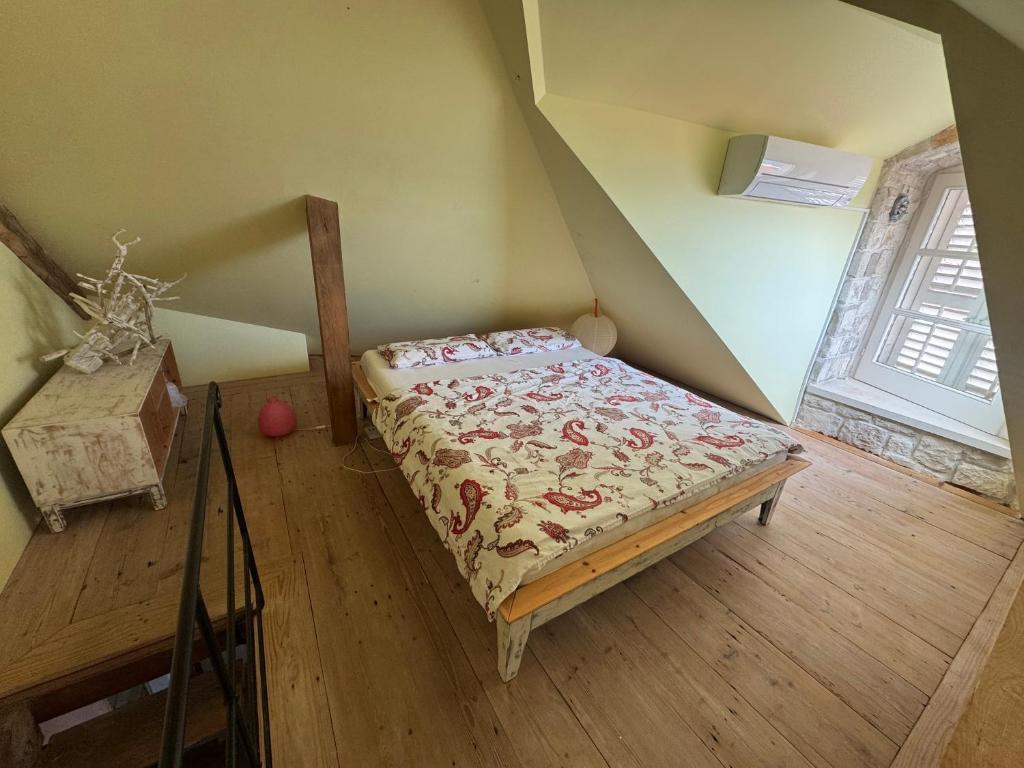 Postel nebo postele na pokoji v ubytování La Belle et la Bête