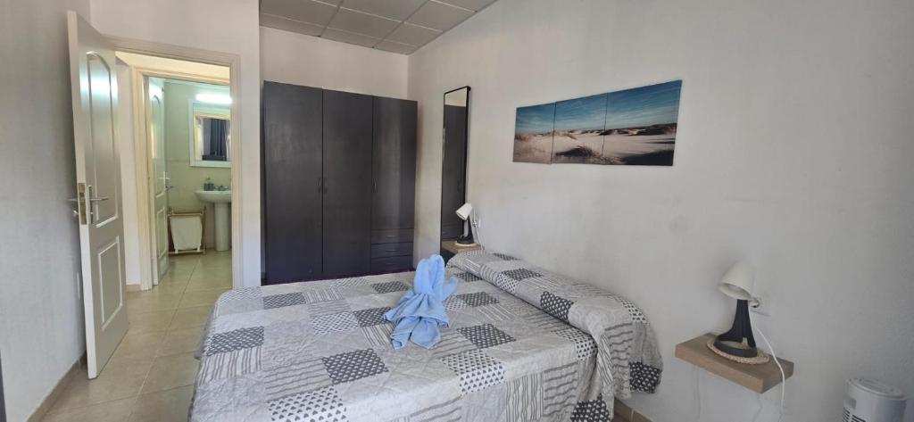 Una cama o camas en una habitación de Casita El Destino