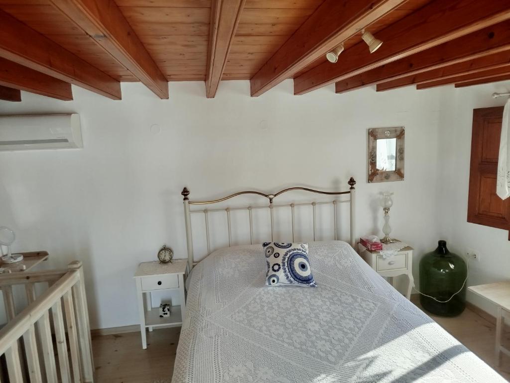 Postel nebo postele na pokoji v ubytování Manos House in Chora