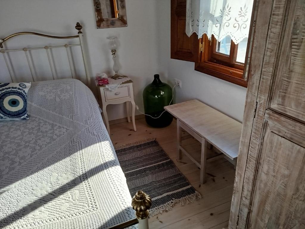 Postel nebo postele na pokoji v ubytování Manos House in Chora