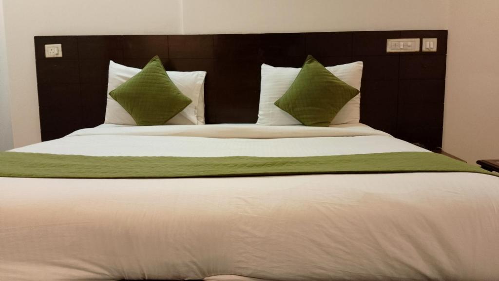 Postel nebo postele na pokoji v ubytování hotel sonu