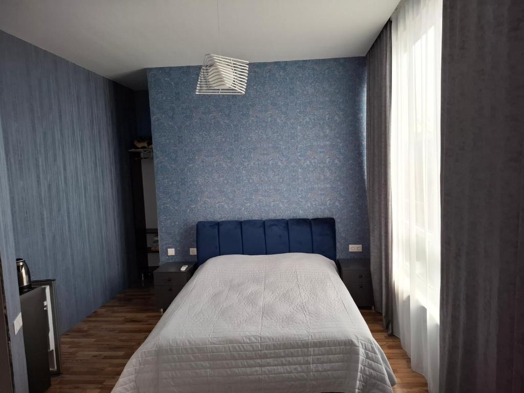 Postel nebo postele na pokoji v ubytování Sea