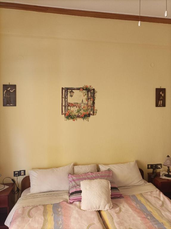Postel nebo postele na pokoji v ubytování Olympiades Rooms Litóchoro