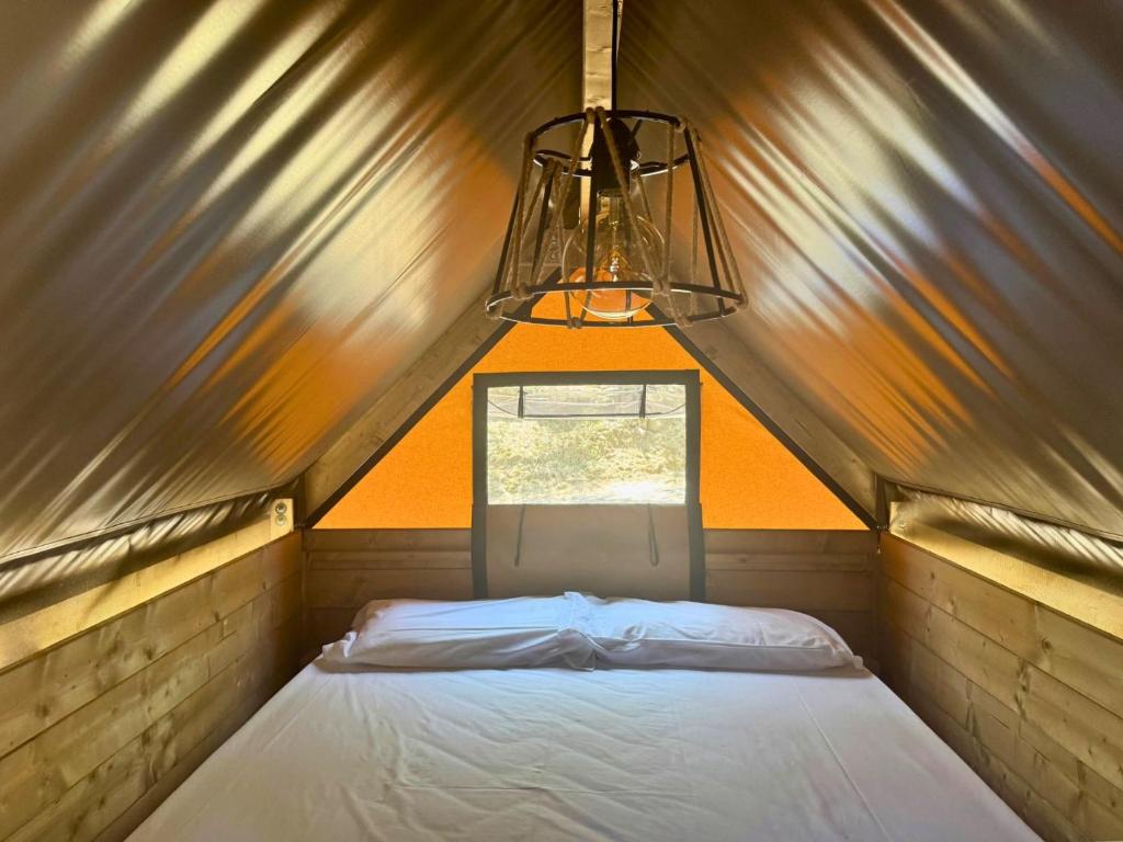 Postel nebo postele na pokoji v ubytování Hostel & Glamping Santa Fortunata