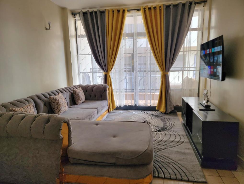 Posezení v ubytování Cozy Apartment