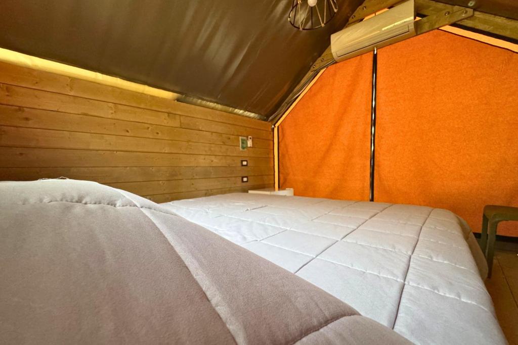 Postel nebo postele na pokoji v ubytování Hostel & Glamping Santa Fortunata