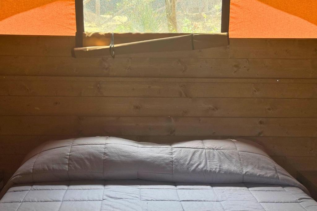 Postel nebo postele na pokoji v ubytování Hostel & Glamping Santa Fortunata