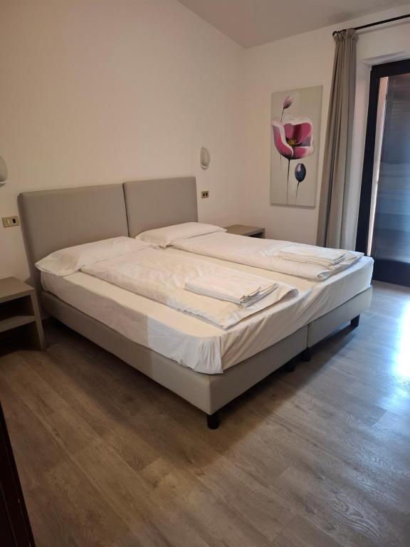 Postel nebo postele na pokoji v ubytování Garni Onda