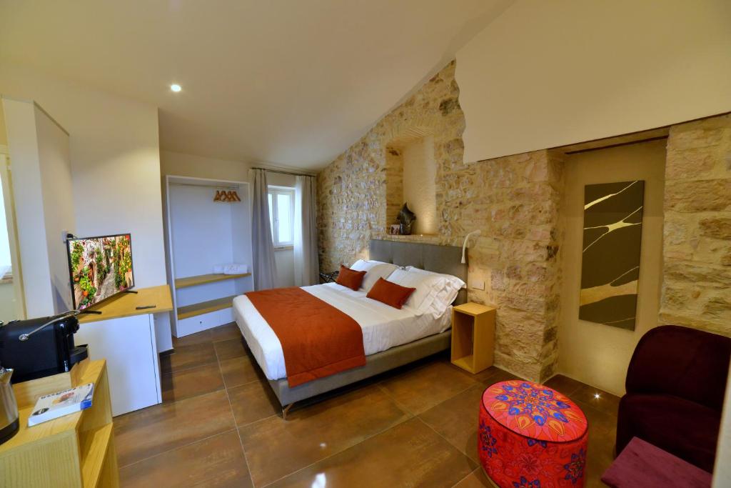 Postel nebo postele na pokoji v ubytování Rooms in Spello