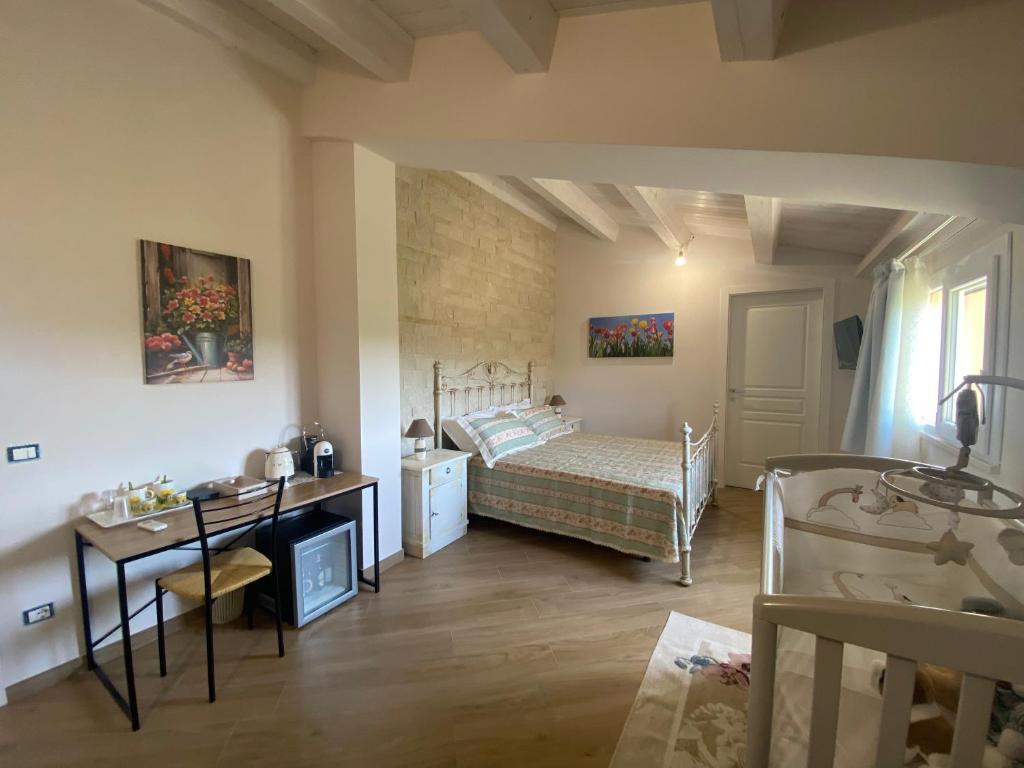 Postel nebo postele na pokoji v ubytování Villa Giusy