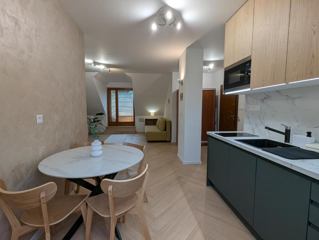 Kuchyň nebo kuchyňský kout v ubytování Apartmany u Denyho