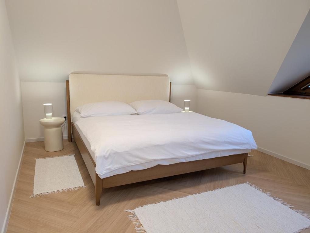 Postel nebo postele na pokoji v ubytování Apartmany u Denyho