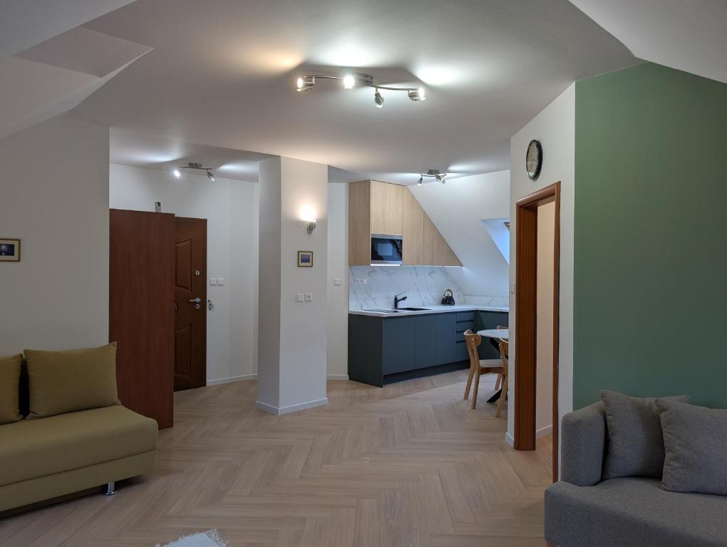 Posezení v ubytování Apartmany u Denyho